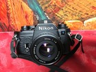 Nikon Em 35mm Film Slr Camera W series E 50mm F 1 8 Lens    Case Tested New Batt