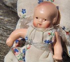 Antique Vintage Jointed Small 3 1 2  Painted Bisque Infant Doll Wooden Crib