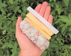 Cleansing Kit  5  Selenite  2 Palo Santo   1 White Sage Smudge Stick  Directions