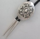 Attractive Southwestern Sterling Silver Repousse Center Bolo Tie