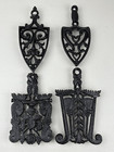 Lot Of 4 Vintage Wilton Cast Iron Footed Trivets Sad Irons Broom Grain Grapes Et