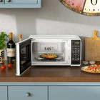 Hot Deal  Mainstays 0 7 Cu Ft Countertop Microwave Oven  700 Watts  White