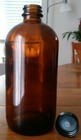 16 Fl Oz Amber Glass Boston Round Bottles W  Black Cone Lined Caps Case Of 12
