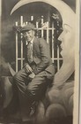 1905 African-american Young Man  Sitting On Paper Moon    rppc Photo Postcard    