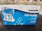Waterpik Family Oral Cleaning System Teeth Irrigator Flosser Wp-70w New Open Box