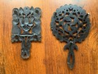 Two Vintage Cast Iron Footed Trivets Stamped Grapevine   Tulip Propeller 270h
