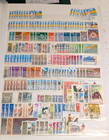 Large Stamp Collection 4x Stockbooks 1000s Mint Used Israel Canada Libya Denmark
