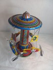 Schylling Reproduction Tin Type Rotating Ride A Rocket Toy 2011 Classic Spins 
