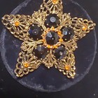 Vintage Star-shaped Gold Tone Brooch With Black   Orange Glass Stones