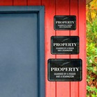 Classic Framed Plus Property Guarded By A Ruger And A Remington  Sign