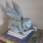 Fantasy Fairy Figurine Lying Down  Butterfly Wings  Holding Bird  Flower Crown