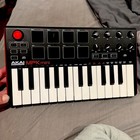 Akai Mpk Mini Mk3 25 Key Electronic Keyboard - Black red white