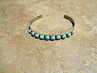 Very Nice      Vintage Navajo Sterling Silver Ten Snake Eye Turquoise Bracelet