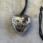 Avon - Outspoken By Fergie  Fleur De Lis Locket With Solid Perfume  heart-shape 