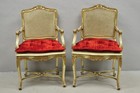 Vintage French Louis Xv Style Cream Painted Carved Wood Cane Arm Chairs - A Pair