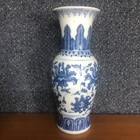 Blue And White Ceramic Vase With Floral Patterns 
