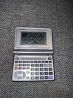 Casio Fx-9860g Slim Graphing Calculator - Compact Size   Good Condition 