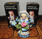 Vintage Porcelain Seamstress Girl Figurine  Sewing Thread Holder Pin Cushion Nib