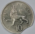 1975 Great Britain Ten New Pence Error Clipped Planchet