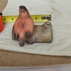 Hand Painted Ceramic Bird Figurine On Log Marked 55 Brown Yellow Orange