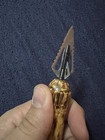 Arrowhead Knife With Burned Wood Handle And Partially Serrated Blade
