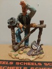 Western Cowboy On Fence Post Statue