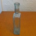 Antique Blue Embossed Glass Medicine Bottle  Vintage Apothecary Style