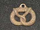 Vtg Souvenir Brass Pretzel Medal pendent - 100th Anniversary Of Reading  Pa