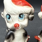 Vintage Salt   Pepper Shakers Skunk With Santa Hats Holiday Christmas