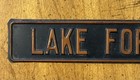 Vintage Lake Forest  Illinois Pressed Metal Sign Black Orange