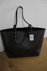  nwt  Coach F36658 Signature Reversible City Tote  Black brown  Pouch Included