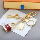 Louis Vuitton Lock And Key Bag Charm Key Holder Red Gold Plated Luxury
