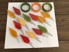 Lot Of 16 Items    13 Vtg  Bakelite Corn Holders   3 Vtg  Bakelite Napkin Rings
