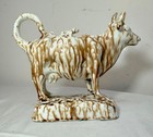 Rare Early Antique Staffordshire Pottery Brown Drip Glaze Cow Creamer Sculpture