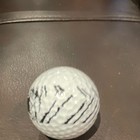 White black Golf Ball - Black Printed Graphic Design On White Ball
