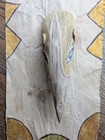 Two Hand-carved Animal Masks On Natural Fiber Wall Hanging