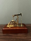 Oil Well Pump Jack Gold Color Model With Wined Up Deep In The Heart Of Texas