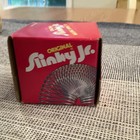 Vintage 1980 s Metal Original Slinky Walking Spring Toy  New In Orig Sealed Box