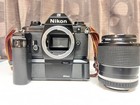 Nikon Em Camera With Md-14 Black Lens Excellent Condition Vintage Model