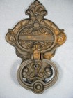 Vintage Cast Iron Door Knocker Features A Cherub Motif Architectural Salvage