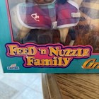 Grand Champions Feed  n Nuzzle Family Box Shows Wear