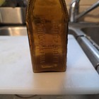 Amber Log Cabin Booz Bottle