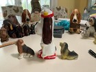 A Bassett Hound Bank And Stone Sitter Bassett Baby And A New Ray Rubber Bassett