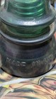 Green Glass Insulator With Black Base Made In U s a 