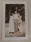 Handsome Father Posing With His Two Cute Daughters Outdoors  Vintage 1940s Photo