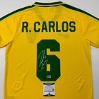 Autographed signed Roberto Carlos Brazil Yellow Retro Jersey Beckett Coa