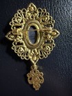 Gold Tone Cameo Brooch With Rhinestones  Dangle Accent  Oval Resin  Black White