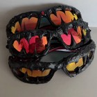 Bold And Avant-garde Sunglasses For A Dark And Venomous Party Look