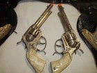 Pair Of Gene Autry Cap Guns And Leather Holster