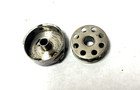 A Vintage Bobbin Case For A Singer Featherweight 221 Sewing Machine